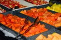 Tropical fruit in buffet trays Royalty Free Stock Photo