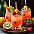 Tropical fruit cocktails with decorative straws and fruit garnishes Royalty Free Stock Photo