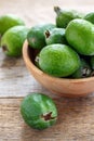 Tropical fruit feijoa in a wooden bowl. Royalty Free Stock Photo