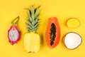 Tropical fruit flat lay on a bright yellow background Royalty Free Stock Photo
