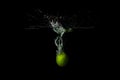 tropical fruit lime fell into the water Royalty Free Stock Photo