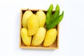 Tropical fruit, Mango in wooden box on white background