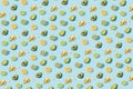 Tropical fruit pattern on a light blue background. Minimal summer layout