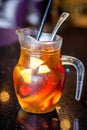 Tropical Fruit Pitcher with tea and kiwi,  orange slices,  strawberries, even lychee Royalty Free Stock Photo