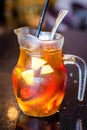 Tropical Fruit Pitcher with tea and kiwi,  orange slices,  strawberries, even lychee Royalty Free Stock Photo