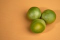 Portion of umbu, or Brazil plum, over orange background