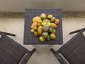 Tropical Fruit On a Small Table on Balcony or Porch Relaxing Royalty Free Stock Photo