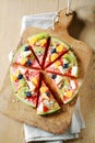 Tropical fruit watermelon pizza on a board