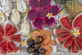Tropical fruits assortment, closeup, top view. Many colorful ripe fruits background. Durian, papaya, watermelon, banana,