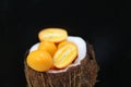 Dwarf bitter oranges served in the coconut