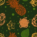 Tropical fruits on green background. Exotic seamless background. pineapple, pitahaya, Carambola, Salak