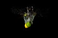 Tropical fruits lemon and lime in water