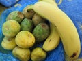 Tropical fruits in a package on the sand in Africa