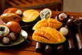 Tropical fruits: passion fruit, rambutan, mangosteen and mangoes Royalty Free Stock Photo