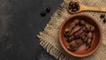 Tropical fruits, Tamarindo beans in shell on a brown butchers block on a dark background, healthy fruit. banner, menu, recipe Royalty Free Stock Photo