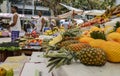 Tropical fruits in a vendor stall at a market