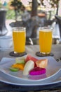 Tropical fuits salad and orange juice as breakfast