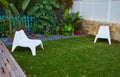 Tropical garden with artificial grass turf wood deck Royalty Free Stock Photo
