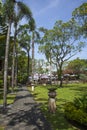 Typical Balinese tropical gardens in the Griya Santrian hotel in Sanur, Bali, Indonesia.