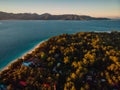 Tropical Gili island with beach and village at sunset or sunrise. Aerial view Royalty Free Stock Photo