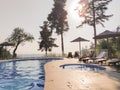 Tropical greek pool sunset tourist hotel luxury Royalty Free Stock Photo