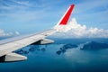 Tropical group of islands in Thailand as seen on window through window of an aicraft.