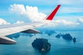 Tropical group of islands in Thailand as seen on window through window of an aicraft.