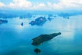 Tropical group of islands in Thailand as seen on window through window of an aicraft. Top view