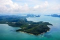 Tropical group of islands in Thailand as seen on window through window of an aicraft. Top view