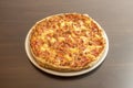 Tropical Hawaiian Pizza with Canned Pineapple Chunks, Ham, and Lots