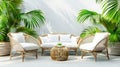 Tropical interior design Modern beige wicker furniture with white cushions, surrounded by plant Royalty Free Stock Photo