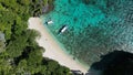 Tropical island with boats in lagoons Royalty Free Stock Photo