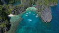 Tropical island with boats in lagoons Royalty Free Stock Photo