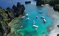 Tropical island with boats in lagoons Royalty Free Stock Photo