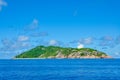 Tropical island coastline in the ocean with blue sky Royalty Free Stock Photo