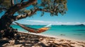 Tropical island destination. palm trees, hammock, and serene sea - ideal vacation getaway Royalty Free Stock Photo