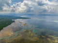 Tropical Island and Fish Farm over the sea in the Philippines. Royalty Free Stock Photo