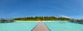 Tropical island landscape panorama with beautiful vibrant ocean and sky Royalty Free Stock Photo