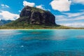 Tropical island with Le Morne mountain, blue ocean and coastline in Mauritius. Aerial view