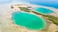 Tropical island with mangroves and turquoise lagoons on a coral reef, top view.Fraser Island, seascape Honda Bay