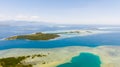 Tropical island with mangroves and turquoise lagoons on a coral reef, top view.Fraser Island, seascape Honda Bay