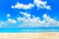 Tropical island paradise beach, blue sea water, turquoise ocean, sand, sun sky white clouds, summer holidays, vacation, travel Royalty Free Stock Photo