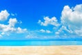 Tropical island paradise beach, blue sea water, turquoise ocean, sand, sun sky white clouds, summer holidays, vacation, travel Royalty Free Stock Photo