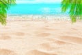 Tropical island paradise beach, green palm tree leaf, sand, blue sea water turquoise ocean, summer holidays, vacation, travel Royalty Free Stock Photo