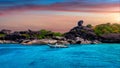 Tropical island at sunset. Sailboat rock with white sand beach at Similan island, Phang Nga, Thailand