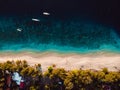 Tropical island with village, beach and turquoise crystal ocean, aerial view. Gili islands Royalty Free Stock Photo