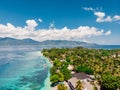 Tropical island with village, beach and turquoise ocean, aerial view. Gili Air island Royalty Free Stock Photo