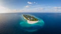 Tropical island with white beach and turquoise water in Maldives. Idyllic summer holidays vacation destination. Luxury hotel