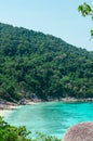 Tropical islands of ocean blue sea water and white sand beach at Similan Islands with famous Sail Rock, Phang Nga