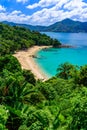 Tropical Laem Sing beach. Beautiful turquoise bay and people relaxing on beach. Paradise coast of Phuket, Thailand